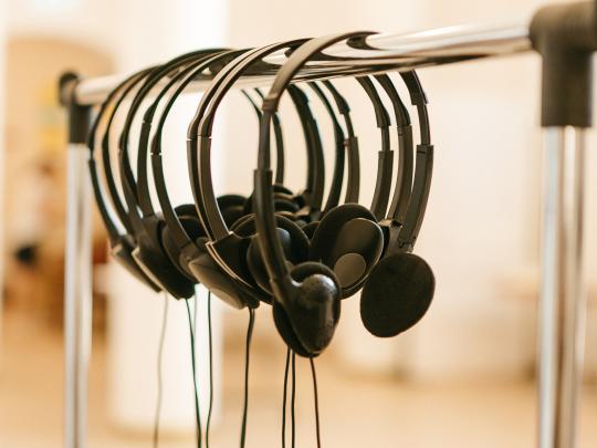 Translator devices in the teathre hall